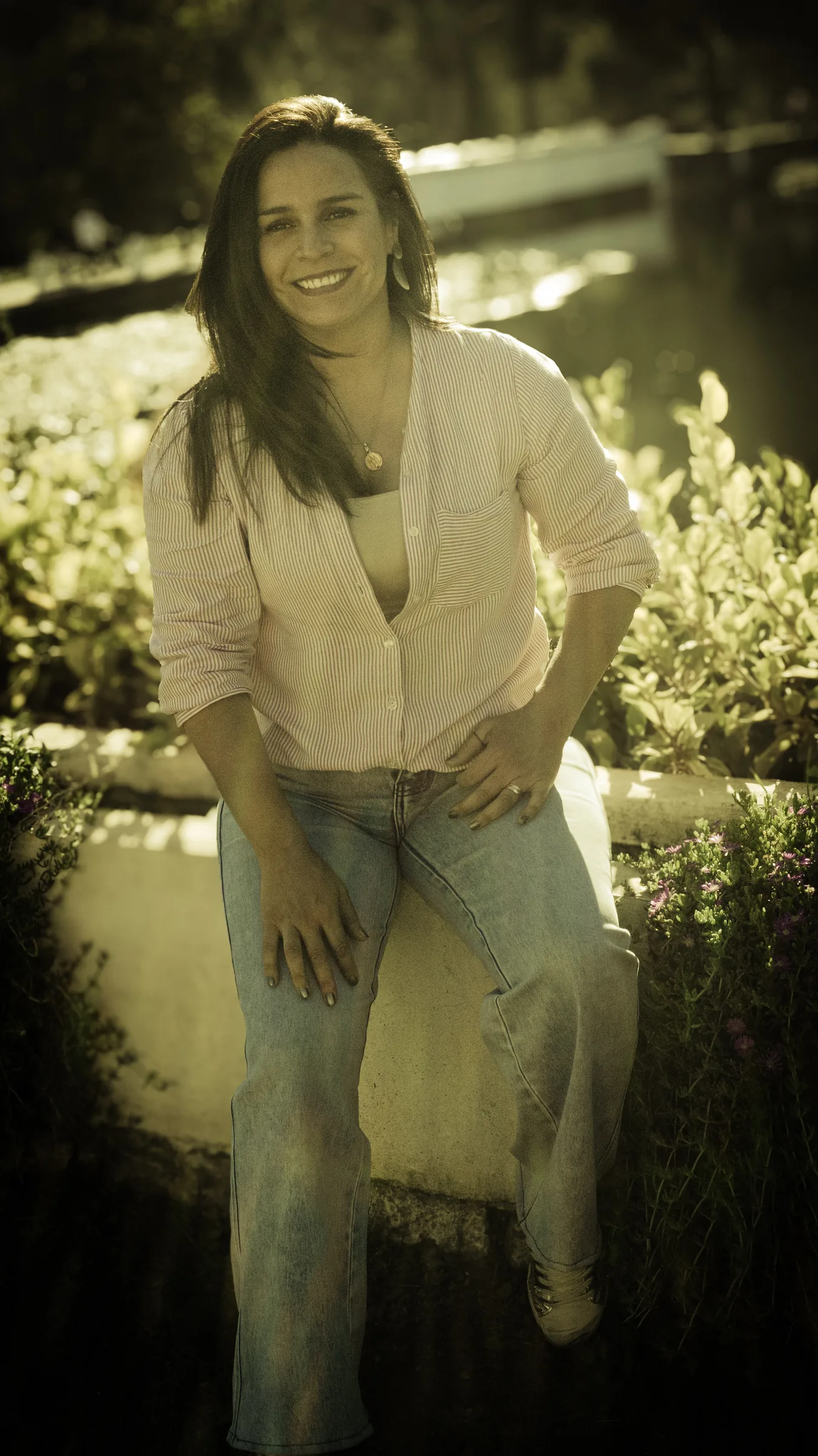Retrato junto a las flores